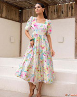 Add Charm to Your Closet with the Chic Multi Floral White Dr...