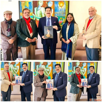 Dr. Sandeep Marwah Presents His Book to Eminent Writers in a Celebrated Literary Exchange