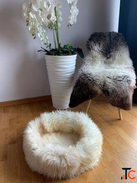 Cat bed made of natural sheepskin