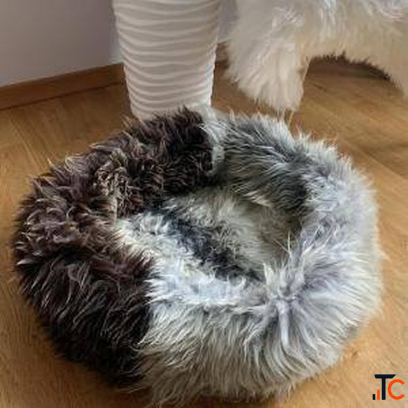 Cat bed made of natural sheepskin