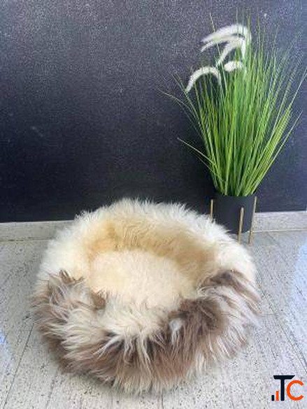Cat bed made of natural sheepskin