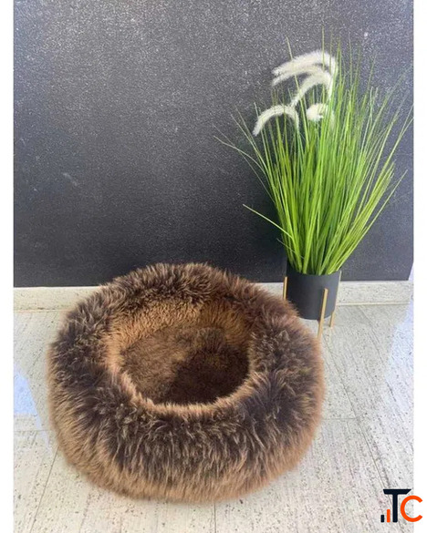 Cat bed made of natural sheepskin
